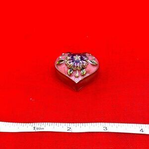Small heart shaped trinket box marked Monet 2006 on the bottom